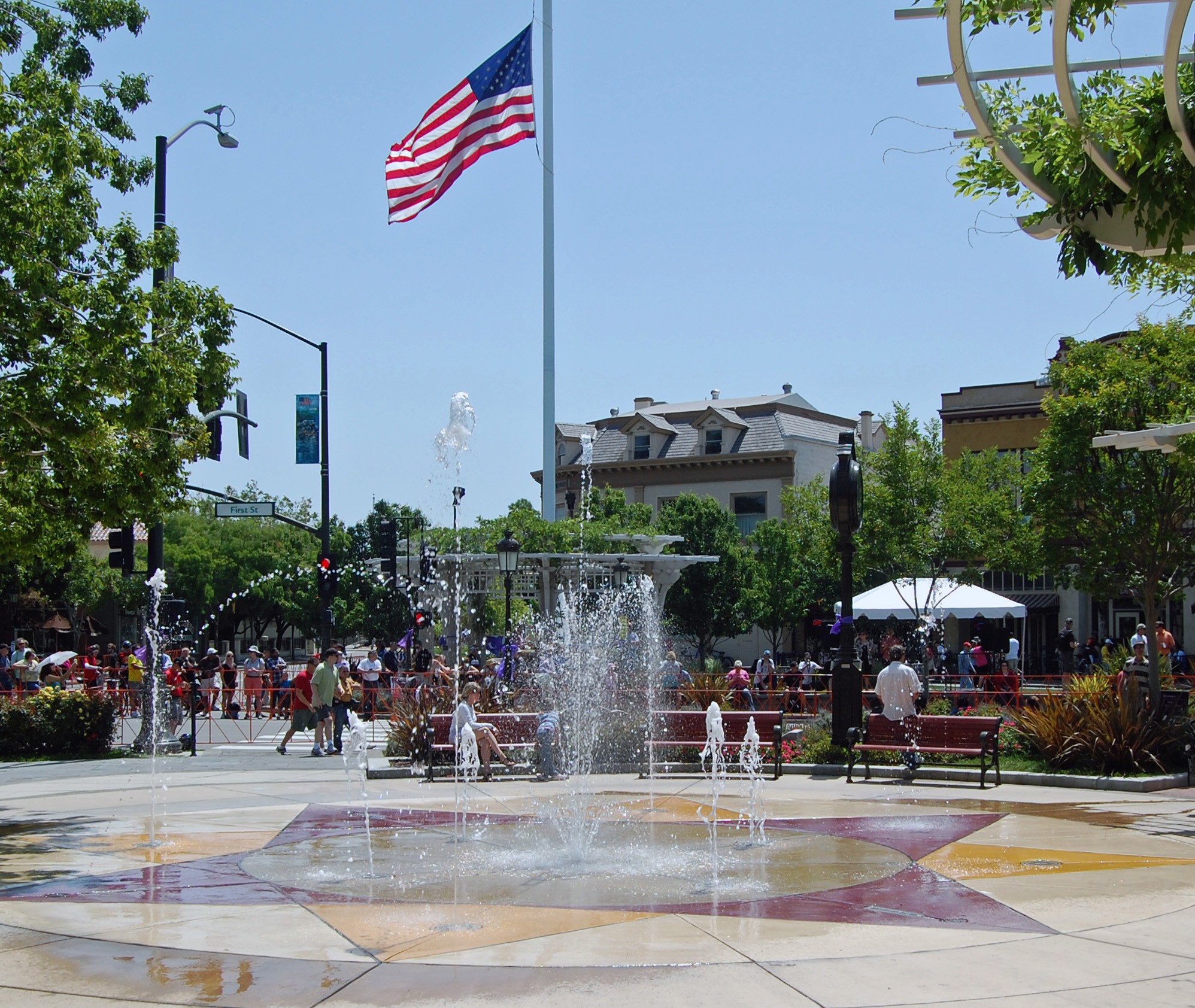 Flag and splash fountain at the Livermore Flagpole Plaza on First Street